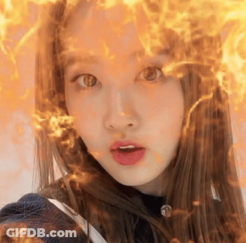 Woman's Face With Fire Hair GIF