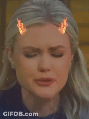 Woman's Face With Flames From Eyes GIF