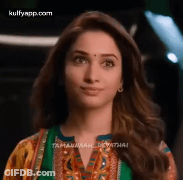 Woman's Face With Green Shirt GIF