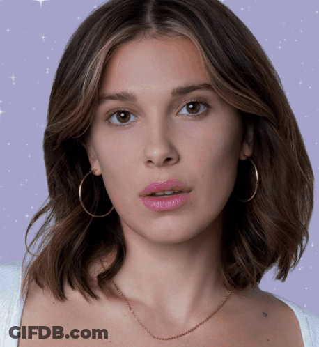 Woman's Face With Hoop Earrings GIF