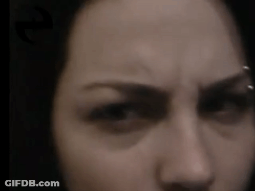 Woman's Face With Letter E Above Eye GIF