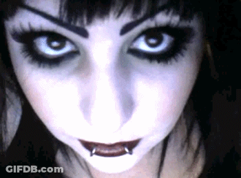 Woman's Face With Lip Piercings GIF
