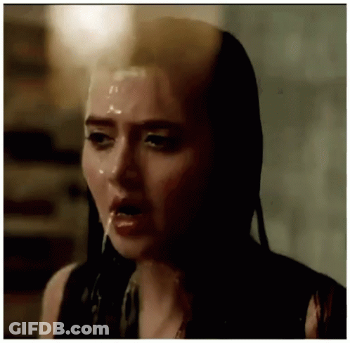 Woman's Face With Liquid On It GIF