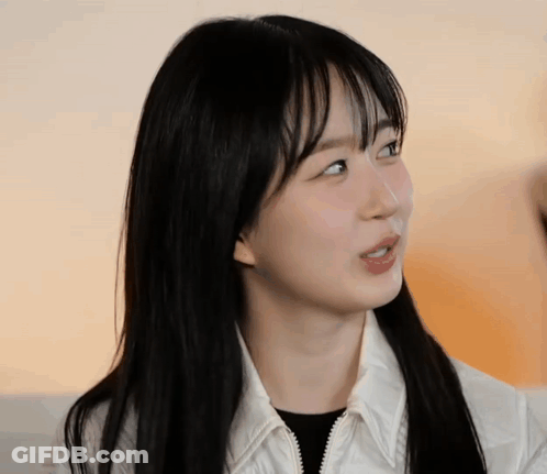 Woman's Face With Long Black Hair GIF