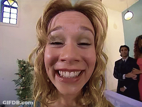 Woman's Face With Man In Suit GIF