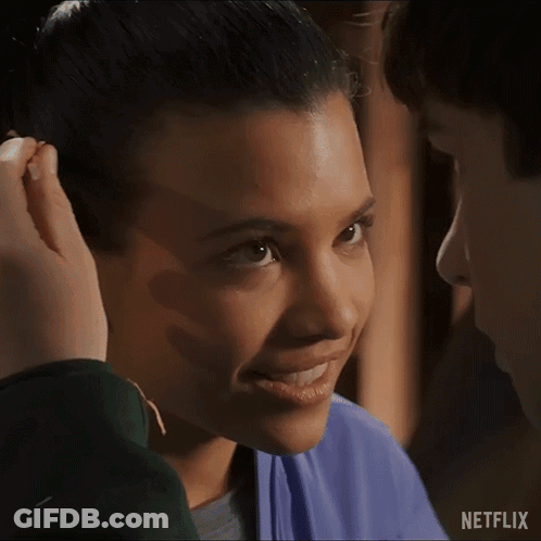 Woman's Face With Man's Hand On Head GIF