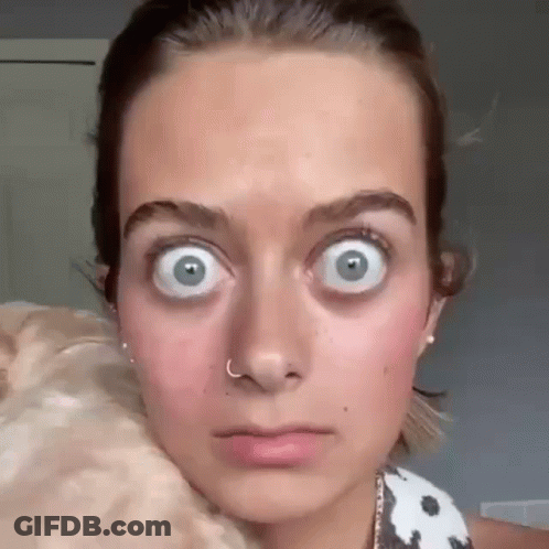 Woman's Face With Nose Ring And Big Eyes GIF