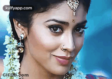 Woman's Face With Nose Ring And Earrings GIF