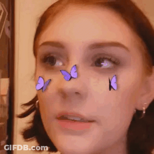 Woman's Face With Purple Butterflies GIF