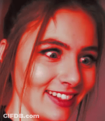 Woman's Face With Red Glow GIF