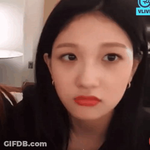 Woman's Face With Red Lips And Earrings GIF
