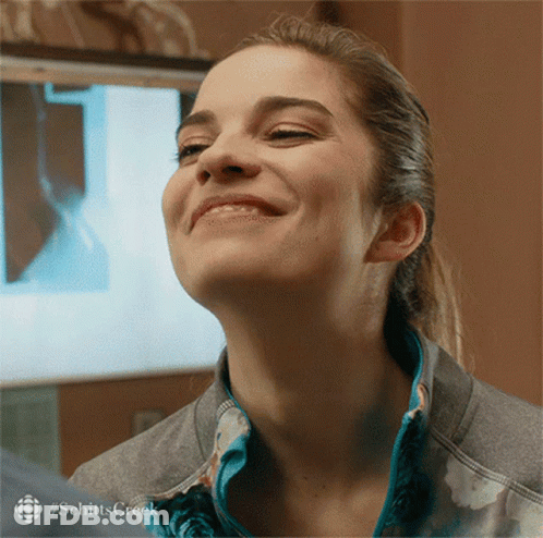 Woman's Face With Schitts Creek Text GIF