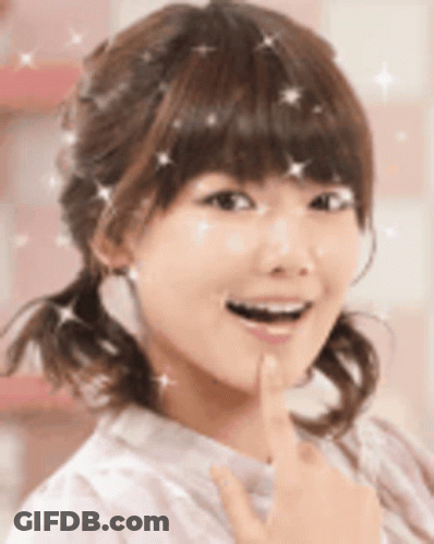 Woman's Face With Sparkles In Hair GIF