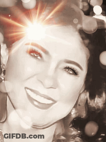 Woman's Face With Sun Through Eyes GIF