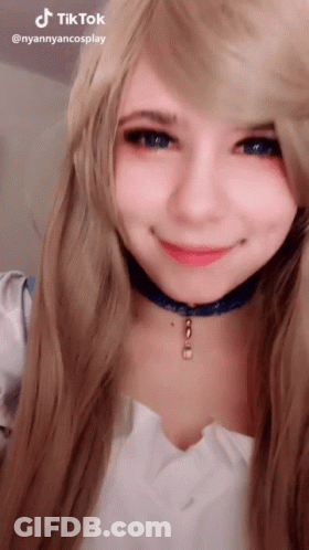 Woman's Face With Tik Tok Text GIF
