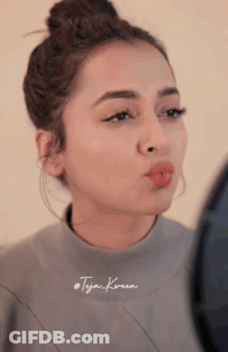 Woman's Face With Tyga Text GIF