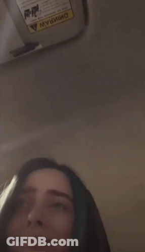 Woman's Face With Warning Sign GIF