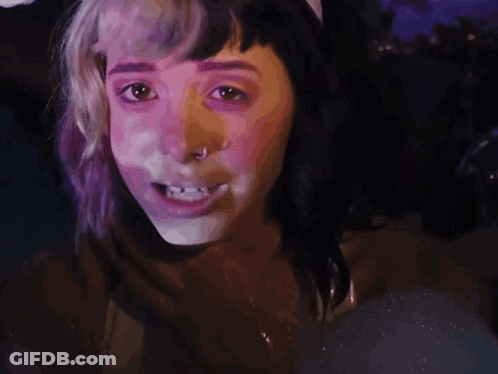 Woman's Face With White Powder GIF