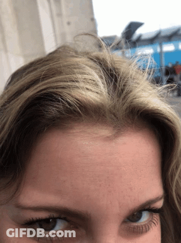 Woman's Forehead With Blue Sky GIF