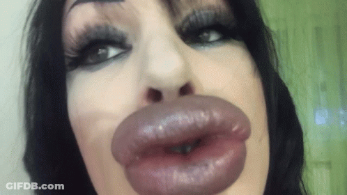 Woman's Lips Close Up Green Background GIF