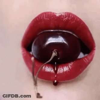 Woman's Lips With Cherry GIF