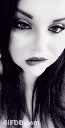 Woman's Mouth With Red Lipstick And White Teeth GIF