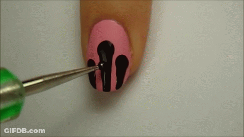 Woman's Nails Painted Pink Black And Green Tip GIF