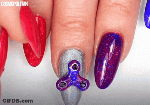 Woman's Nails With Fidget Spinner GIF