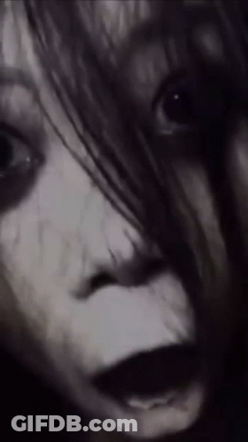 Woman's Scary Face Close Up GIF