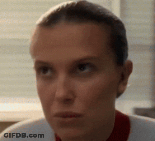 Woman's Serious Face Close Up GIF