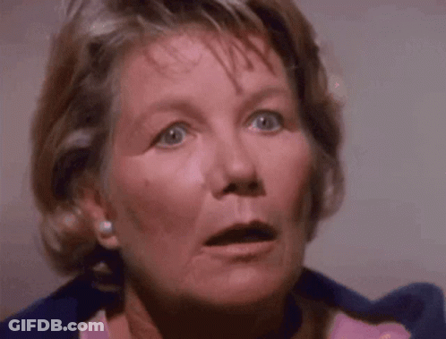 Woman's Surprised Face Close Up GIF