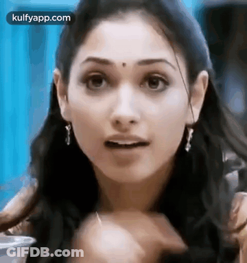 Woman's Surprised Face Close Up GIF