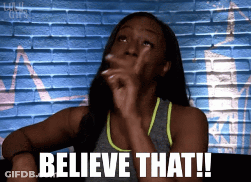 Woman Saying Believe In Front Of Blue Wall GIF