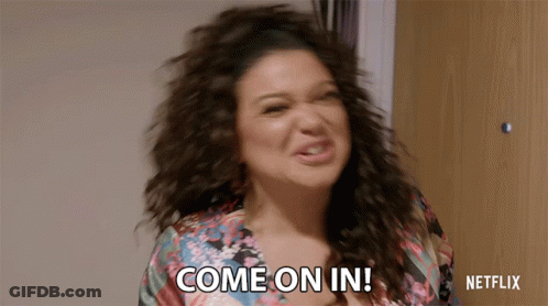 Woman Saying Come On In In Front Of Netflix Logo GIF