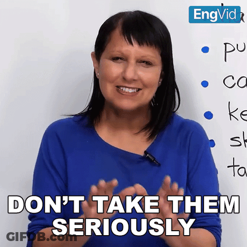 Woman Saying Don't Take Them Seriously In Front Of Whiteboard GIF