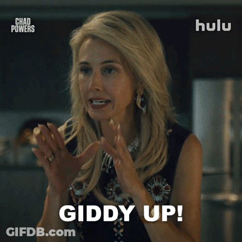 Woman Saying Giddy Up In Front Of Hulu Ad GIF