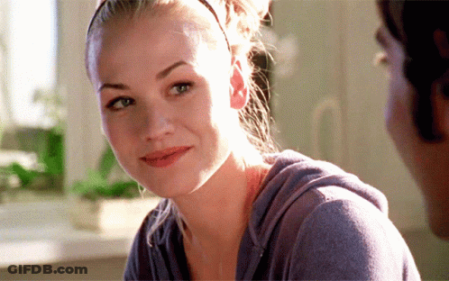 Woman Saying Happy Thanksgiving Man In Striped Shirt GIF