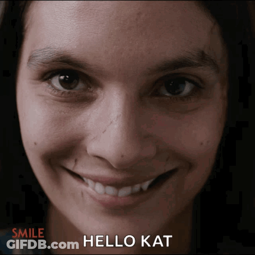 Woman Saying Hello Kat GIF