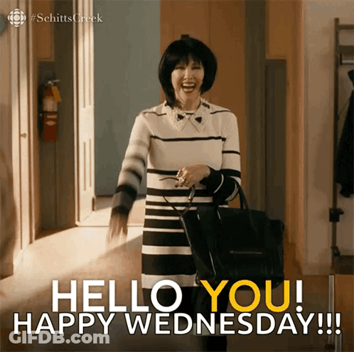 Woman Saying Hello You Happy Wednesday With Black Purse GIF