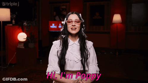 Woman Saying Hi I'm Poppy GIF