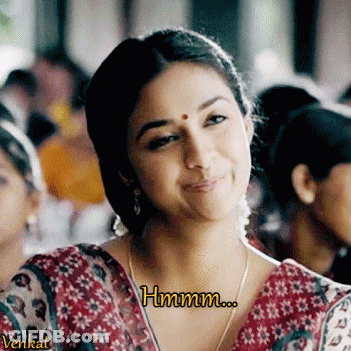 Woman Saying Hmm GIF