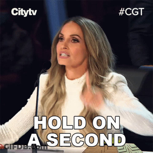 Woman Saying Hold On A Second At Microphone GIF