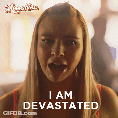 Woman Saying I Am Devastated In Front Of Moonshine Ad GIF