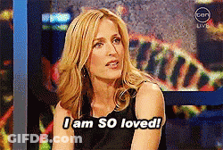 Woman Saying I Am So Loved In Front Of Screen GIF