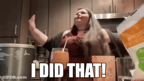Woman Saying I Did That Holding Drink GIF