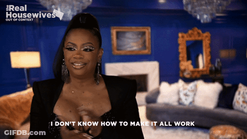 Woman Saying I Don't Know Blue Wall GIF