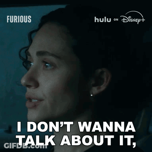 Woman Saying I Don't Wanna Talk About It In Dark Room GIF