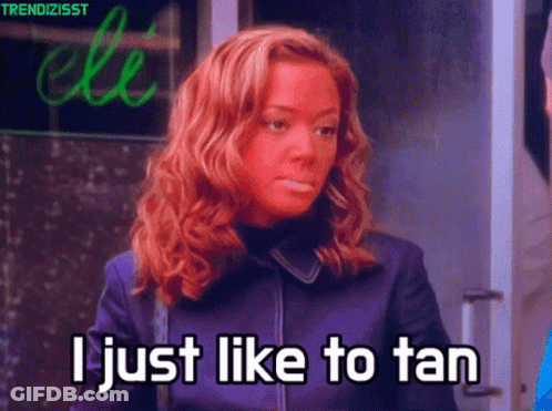 Woman Saying I Just Like To Tan In Purple Jacket GIF
