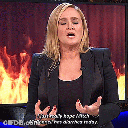 Woman Saying I Just Really Hope Mitch McConnell Has Diarrhea Today In Flames GIF