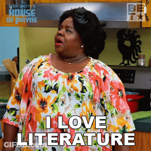 Woman Saying I Love Literature In Kitchen GIF